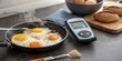 © Justlight - Breakfast Prep A closeup of eggs sizzling in a pan as a glucose meter rests nearby on the counter showcasing a spike in levels alongside the morning meal preparation.