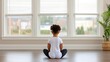© nilawan - Child practices mindfulness by meditating peacefully in a bright serene room
