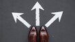 © THESUN - Leather shoes with arrows shooting out in 3 directions. Concept of business strategy or options.