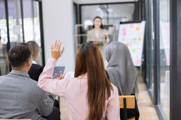 Team of Asian business people and working together in office, Startup projects and business presentation at meeting room.