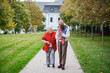 © Halfpoint - Portrait of a granddaughter on an autumn walk in the park with her grandmother.