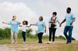 © lovelyday12 - group of people wearing blue shirts are walking together
