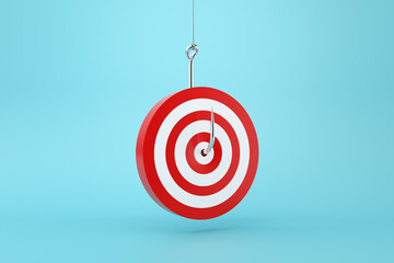 Wall Mural - fishing hook catching red and white target on blue background