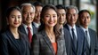 © Thanaporn - Group portrait of Cambodian professionals, young and senior, formal attire, isolated, white background