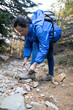© Arpad - Spanish tourist woman with glasses tie your shoelaces
