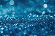 © Chotijah - Abstract Blue Glitter Background with Bokeh Lights