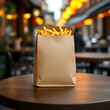 © Ubed Nur - Burger and Fries Packaging Mockup on Cafe Table with Blank Design for Branding