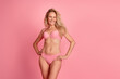 © deagreez - Photo of positive lovely charming woman wear stylish lingerie isolated on pink color background