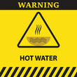 © artshotphoto - Warning hot water symbol in a triangle on yellow background with text