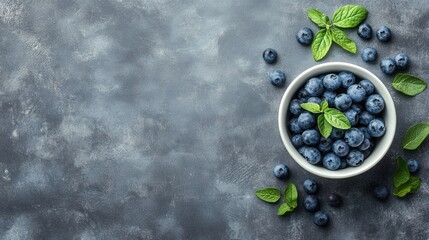 Wall Mural - Fresh blueberries in a white bowl on a gray background