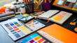 © sonswirl - A close-up of an artist's desk with various tools and color swatches.