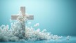 © Thanaseth - Wooden cross decorated with white flowers, light blue background, representing a Christian funeral service, generative AI, soft and peaceful composition