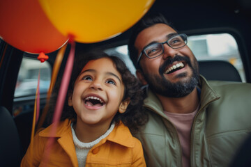 Wall Mural - Indian ethnic young father and daughter sitting inside a car and having fun