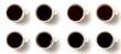 © Andrei - Eight White Coffee Cups on White, Some Containing Varying Amounts of Coffee, Top View