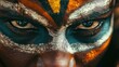 © Oleg - Athlete with tribal face paint on, expressing intensity and victory.