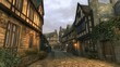 © mashimara - A row of charming half-timbered houses along a narrow street in a quaint English village, surrounded by greenery. Concept: heritage, culture.