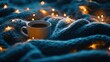 © Aliaksandr Siamko - Warm blanket with holiday lights and a cup of cocoa on a cozy background