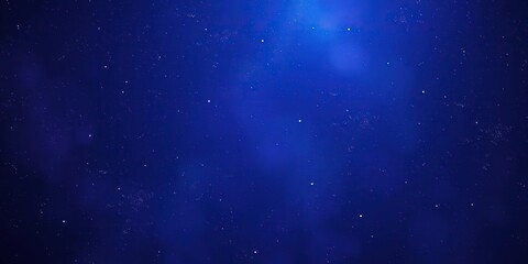 Wall Mural - rich shades of indigo, blue, and purple dominating the scene with delicate white stars and wispy clo
