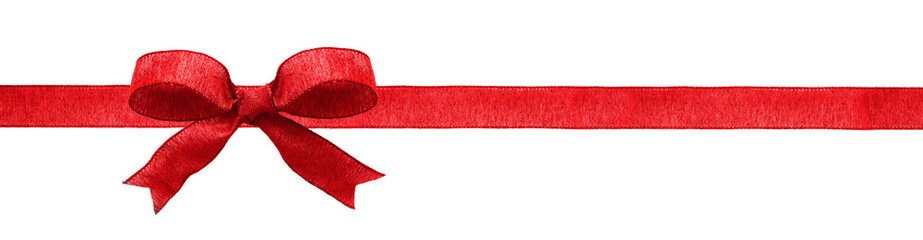 Wall Mural - Red fabric Christmas gift bow and ribbon. Long border isolated on a white background.