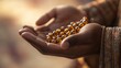 © EddieSnapix - A pair of hands gently cradles beautiful prayer beads, symbolizing reflection and spirituality during Ramadan. The warm ambiance enhances the sense of devotion