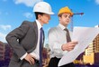 © BillionPhotos.com - Civil engineer and architect discuss at construction site