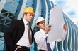 © BillionPhotos.com - Civil engineer and architect discuss at construction site