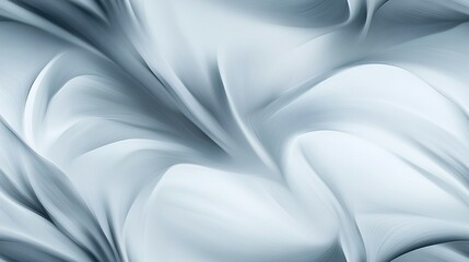  A zoomed-in picture of a white cloth with a black and white pattern at the base, and the base of the cloth with a black and white design below it