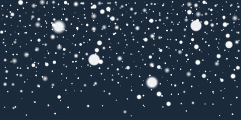 Wall Mural - snowflakes on a dark blue background. light snowfall creates a winter scene for seasonal and festive