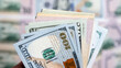 © ADDICTIVE STOCK - Stack of dollar bills showcasing wealth and financial success