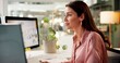 © peopleimages.com - Woman, reading and computer screen in office for business, positive feedback and new opportunity. Mature entrepreneur, smile and tech in startup company for creative writing for project development