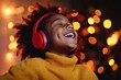 © Papukos - Young girl enjoying music with headphones and christmas lights