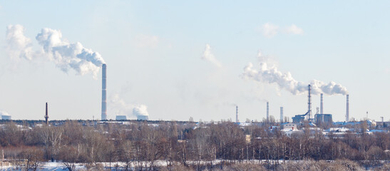 Wall Mural - A large industrial area with many factories and power plants