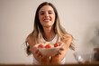 © Lomb - Smiling woman holding healthy salad bowl fresh vegetables happiness wellness lifestyle nutrition diet joy
