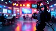 © Din Nasahrudin - Recording an interview on camera in a television studio with a blurred background, demonstrating media technologies. Creation of a conceptual television studio