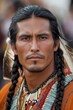 © Rudsaphon - Thoughtful Indigenous American Warrior in Traditional Tribal Costume