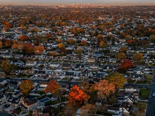 Wall Mural - Aerial view of suburban neighborhood in autumn.