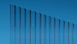 © Westend61 - Corrugated wall in front of blue background