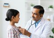 © Anna - Pediatric checkup: doctor using stethoscope on young girl in clinical setting