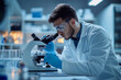 © s1llu - Scientist Examining Sample Under Microscope