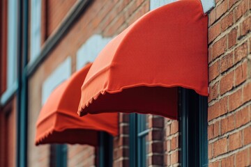 Wall Mural - Orange awning on a brick building exterior, great for architecture or urban shots