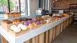 © EF Studio - Bakery with Shelves Full of Different Types and Shapes of Breads, Pastries, Cookies, and Cakes