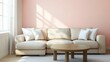 © Rangga Bimantara - A cozy living room featuring a beige sofa and a wooden coffee table against a pink wall.