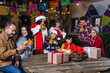 © Marcos - Mexican Family celebrating traditional party or posadas for Christmas eve and holidays in Mexico Latin America