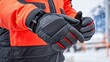 © bteeranan - Close-up View of Extra Thick Gloves Designed for Cold Weather in Winter Outdoor Activities with Red and Black Color Scheme for Maximum Grip and Protection