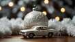 © Sughra - Lightning XL Toy car and white Christmas ball Small car with white Christmas toys against light background.