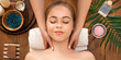 © Prostock-studio - Happy girl on massage wood table with palm leaves and salt