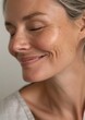 © Rawpixel.com - A middle age woman happy with no makeup smile skin female.
