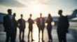 © Dmytriy - Blurred image of silhouettes of business people at an airport, preparing for a flight on a private jet for a business meeting