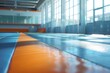 © Ева Поликарпова - A vibrant blue and orange gym floor with markings and lines