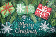 © River Girl - A festive Christmas background featuring lush green pine needles, neatly wrapped gift boxes, and delicate snowflakes, with the cheerful text 'Merry Christmas' centered in the image, creating a warm an